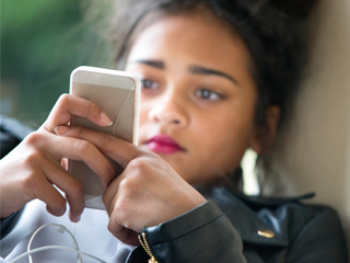 teen girl on cell phone