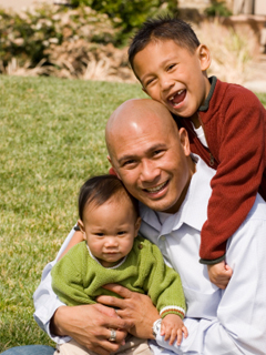 Happy Father with his two boys