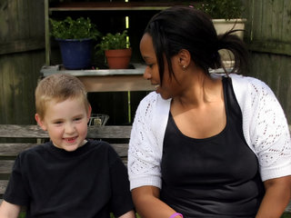 lady and boy on bench