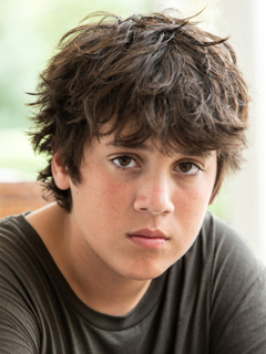 young teen boy with messy hair