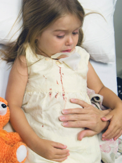 scared little girl in the ER